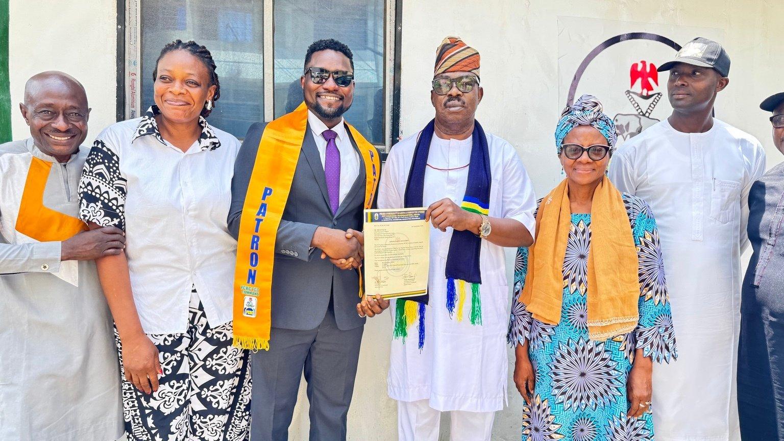 Mr. Edwin Peprah with Dr. Rufus Ebegba and members of the PCRC leadership.